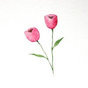 After painting two tulips with their stems and leaves, it's time to add the final details. Load up your brush with brown pigment and use the tip of your brush to add small round dots at the centre of the tulips. These tiny stipples represent the seeds.